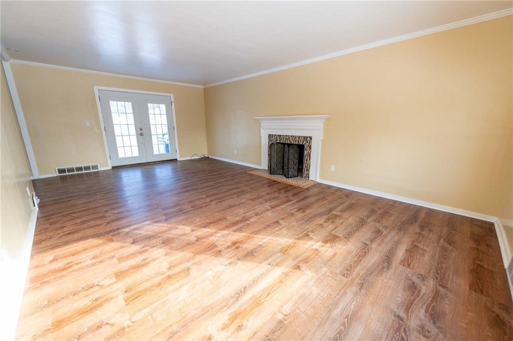528 Wimer Circle Pittsburgh, PA 15237 - Photo 12 of 48 a view of empty room with wooden floor and fan