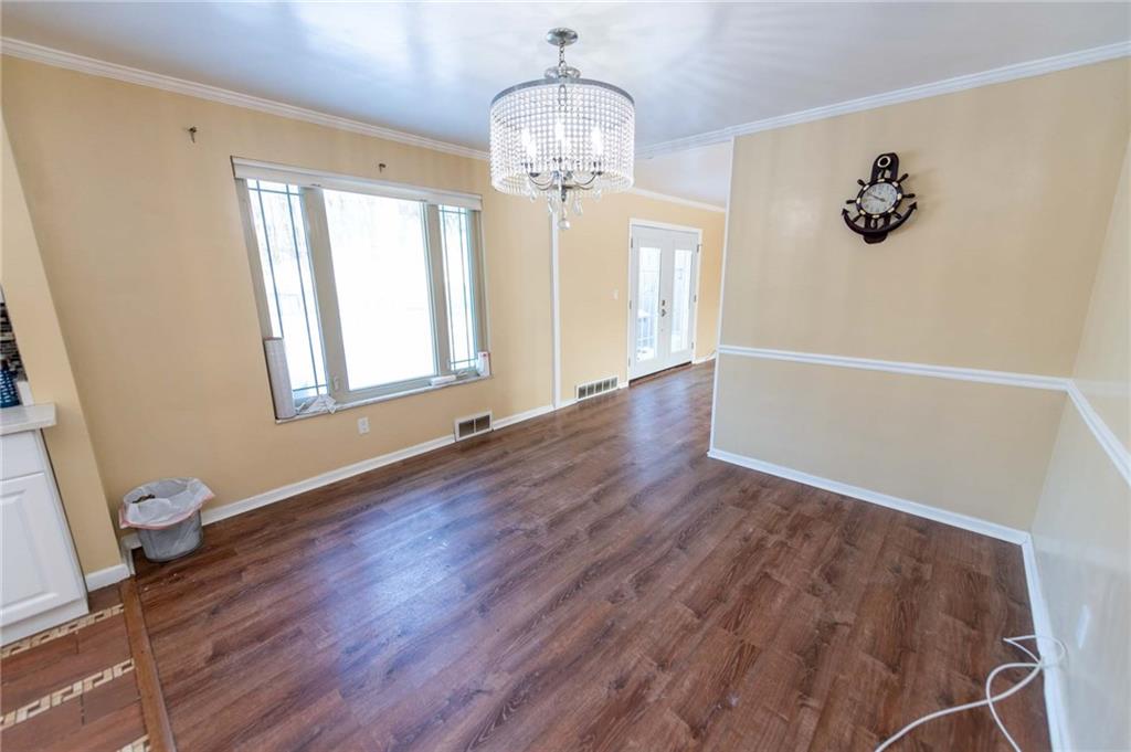 528 Wimer Circle Pittsburgh, PA 15237 - Photo 14 of 48 a view of livingroom with hardwood floor and hallway