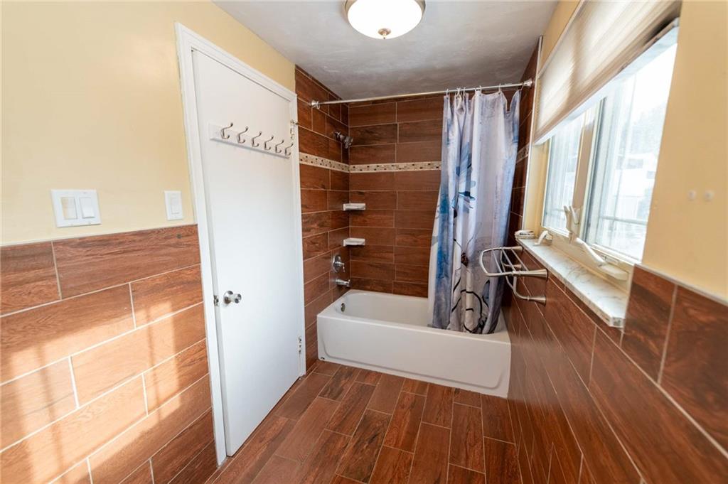 528 Wimer Circle Pittsburgh, PA 15237 - Photo 29 of 48 a bathroom with a bathtub a toilet and a shower