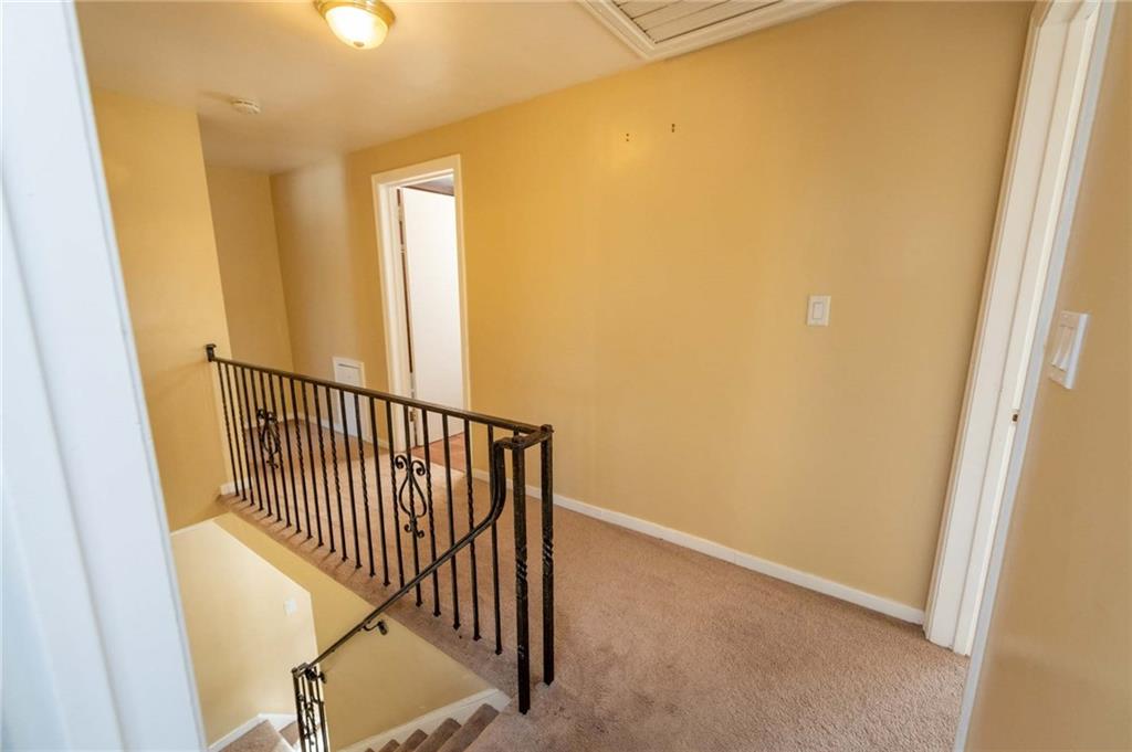 528 Wimer Circle Pittsburgh, PA 15237 - Photo 38 of 48 a view of a hallway with wooden floor and a window