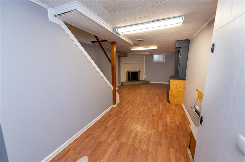 528 Wimer Circle Pittsburgh, PA 15237 - Photo 39 of 48 a view of a hallway with wooden floor and staircase