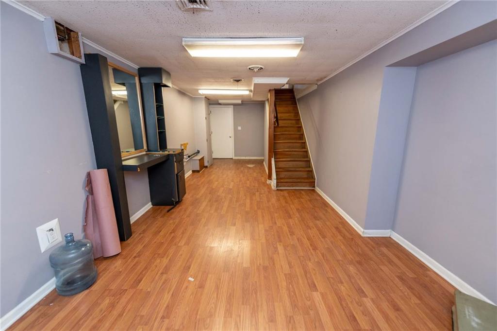 528 Wimer Circle Pittsburgh, PA 15237 - Photo 40 of 48 a view of a room with wooden floor and staircase