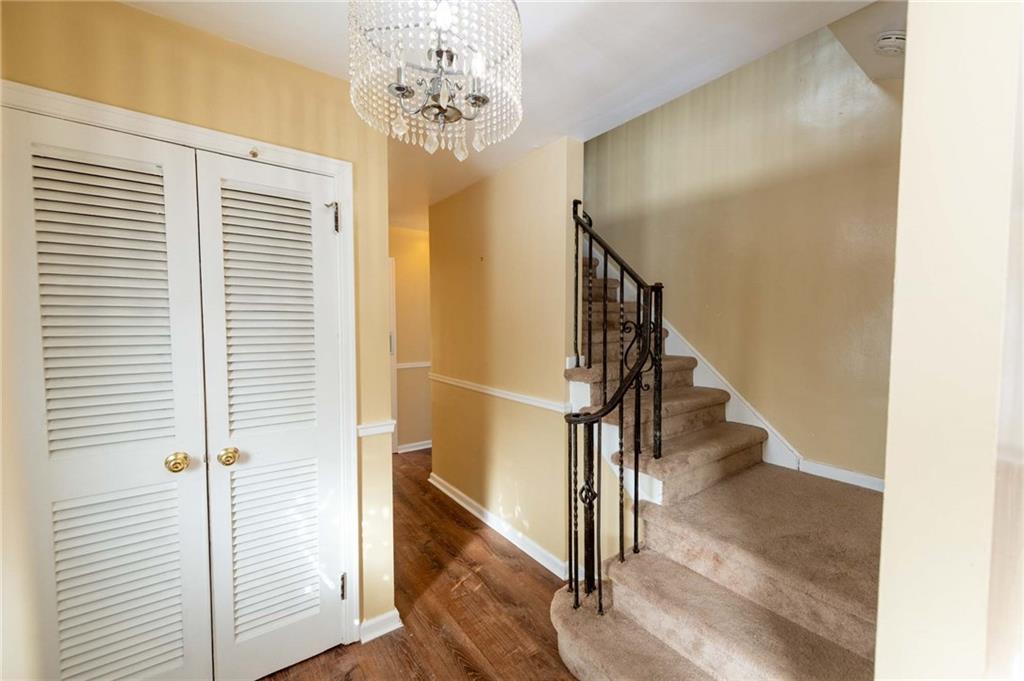 528 Wimer Circle Pittsburgh, PA 15237 - Photo 4 of 48 a view of a hallway with wooden floor and staircase