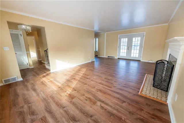 a view of room with wooden floor and chair