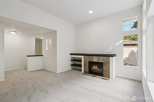 a room with furniture and a fireplace