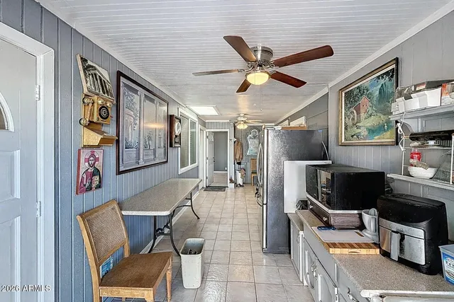 a view of a hallway with a bathroom