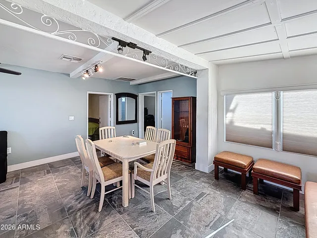 a view of a dining room with furniture