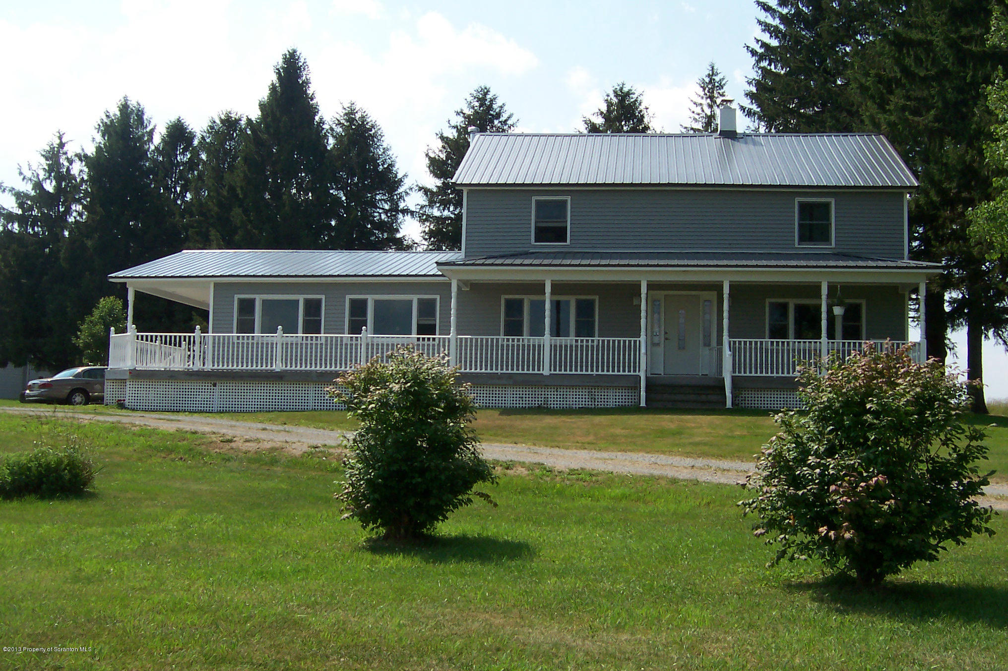 4477 State Rte 2023 Union Dale, PA 18470 - Photo 1 of 28 a view of a house with a swimming pool
