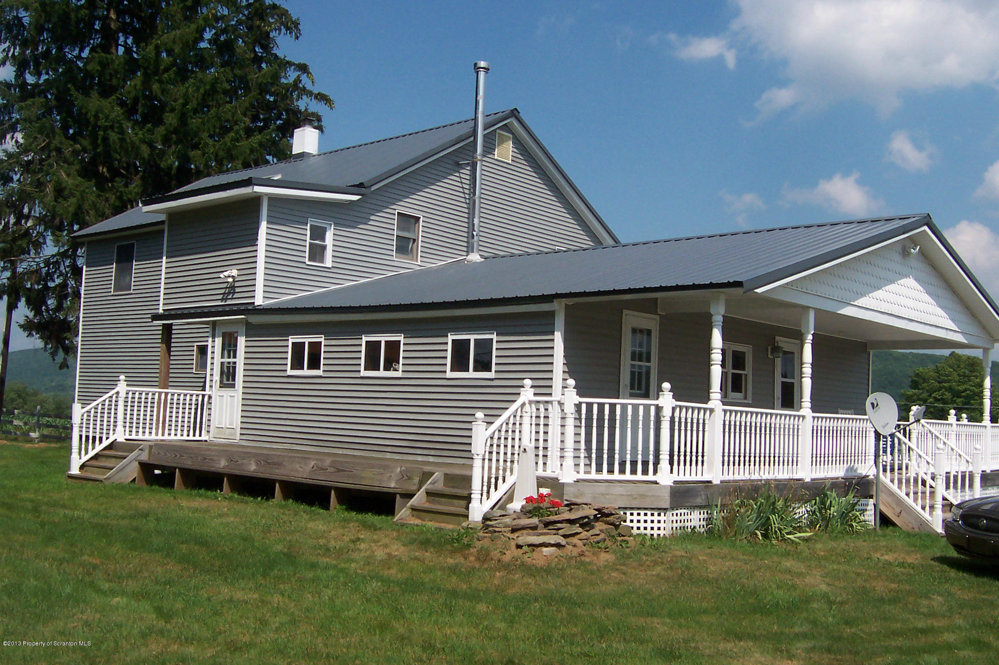 4477 State Rte 2023 Union Dale, PA 18470 - Photo 15 of 28 a front view of a house with a yard