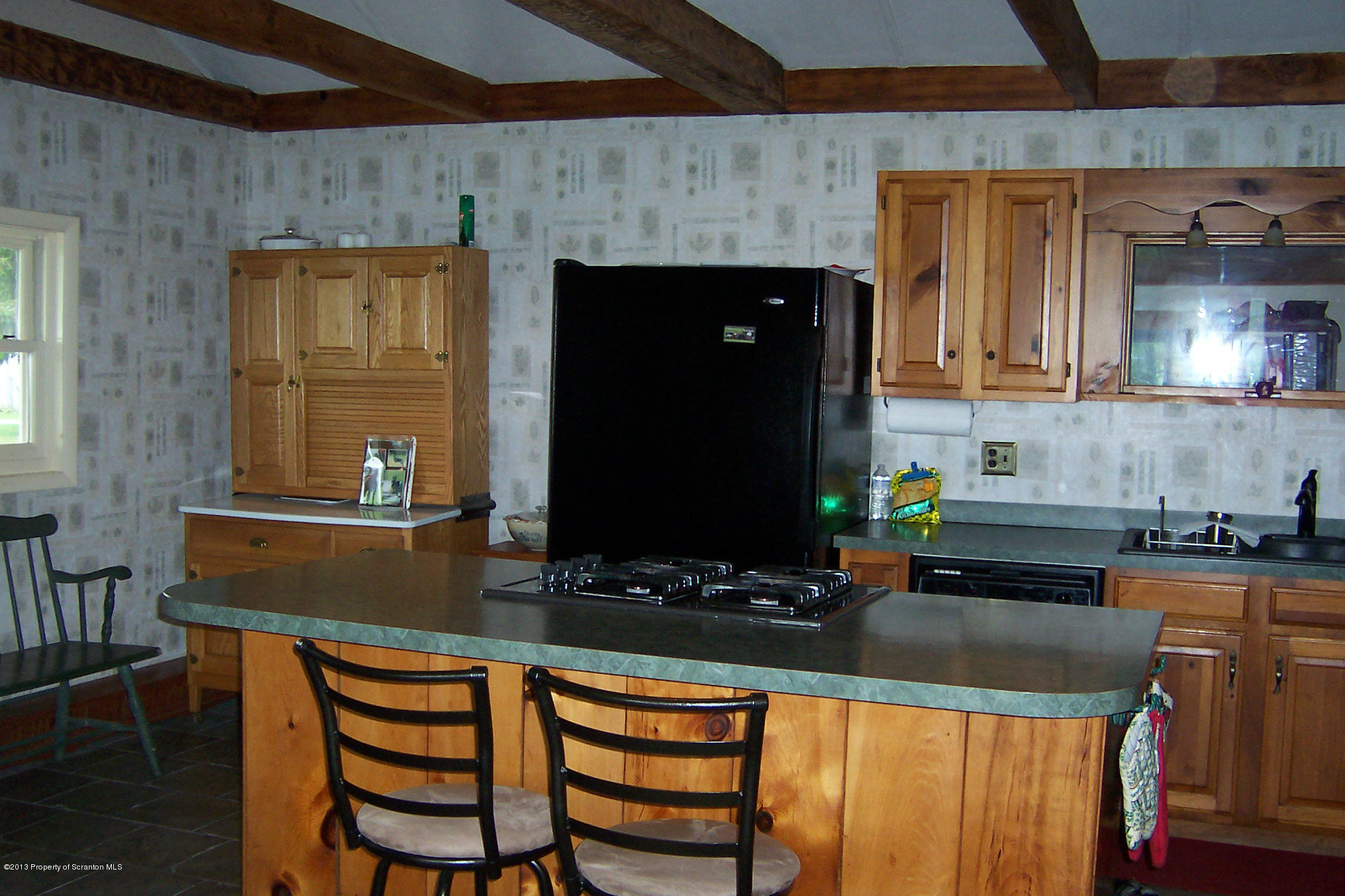 4477 State Rte 2023 Union Dale, PA 18470 - Photo 3 of 28 a kitchen with a sink and a stove top oven