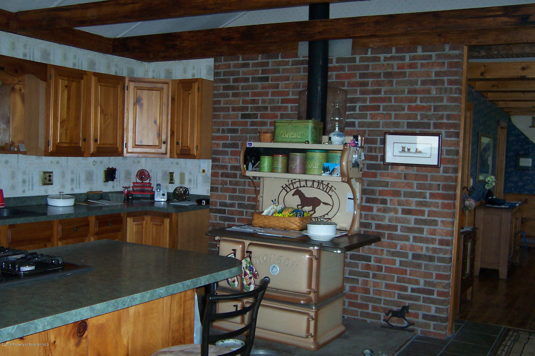 4477 State Rte 2023 Union Dale, PA 18470 - Photo 4 of 28 a kitchen with a sink stove and cabinets