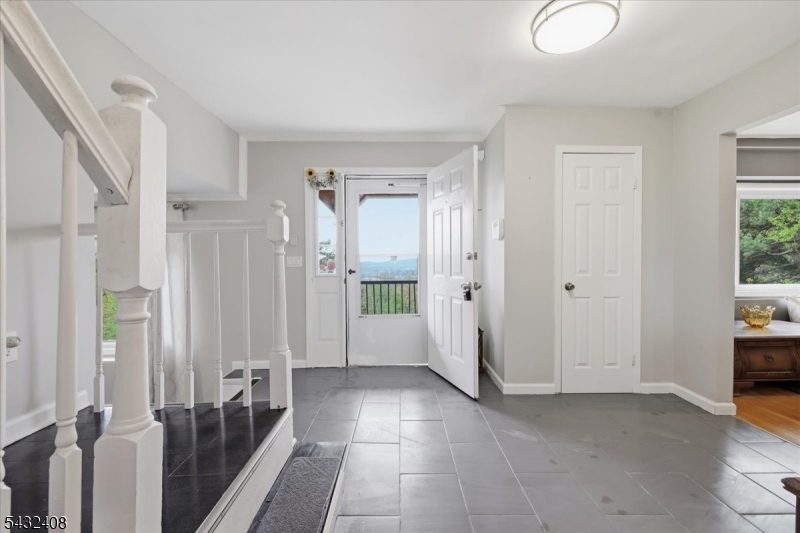 112 Knob Hill Road Hackettstown, NJ 07840 - Photo 4 of 32 a view of a livingroom with furniture and front door