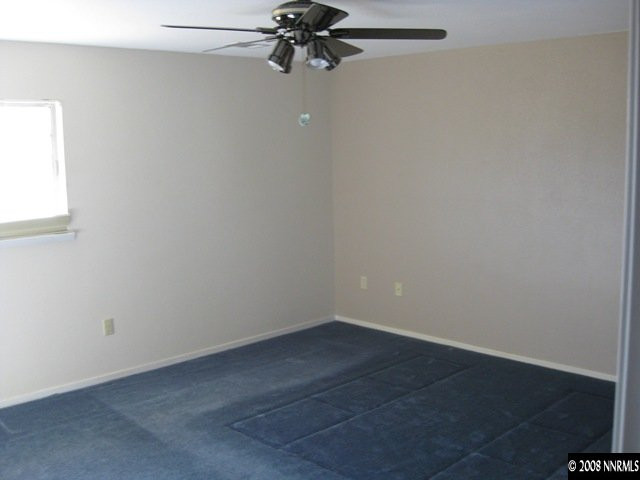 276 River Boat Road Dayton, NV 89403 - Photo 4 of 8 wooden floor in an empty room