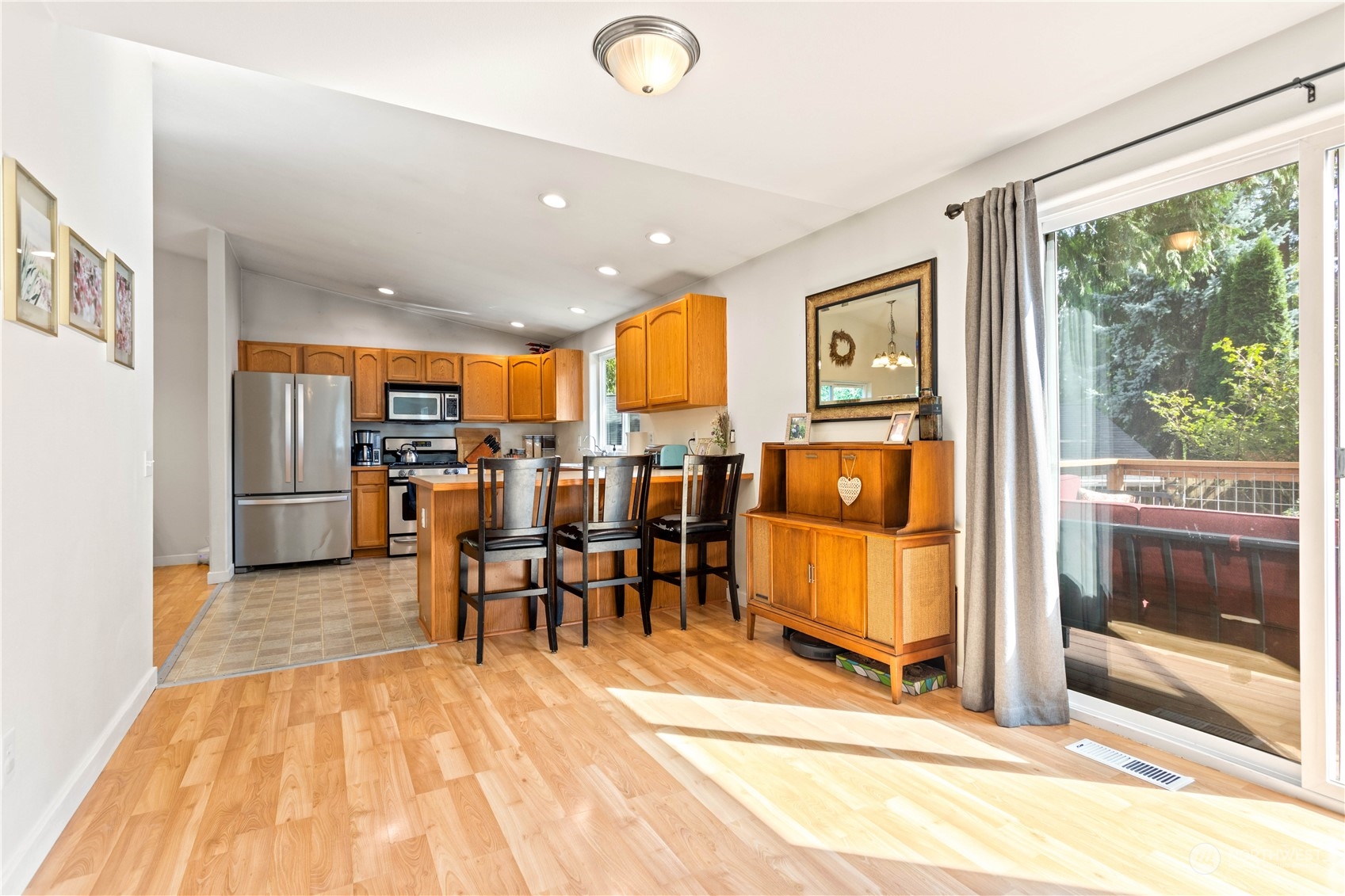 3083 Ash Way Sedro-Woolley, WA 98284 - Photo 15 of 36 a dining hall with stainless steel appliances granite countertop a refrigerator and a sink