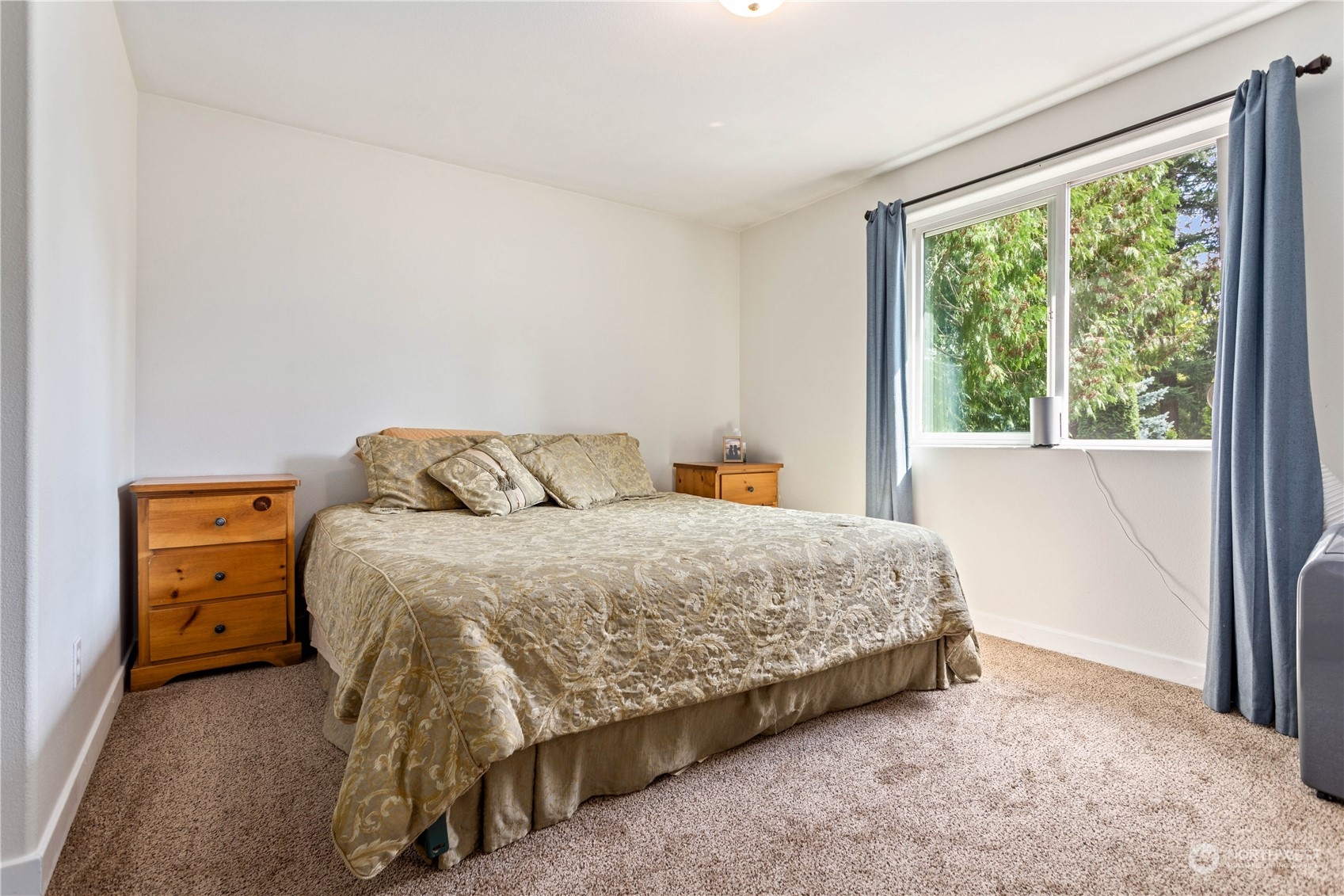 3083 Ash Way Sedro-Woolley, WA 98284 - Photo 18 of 36 a bedroom with a bed and a window