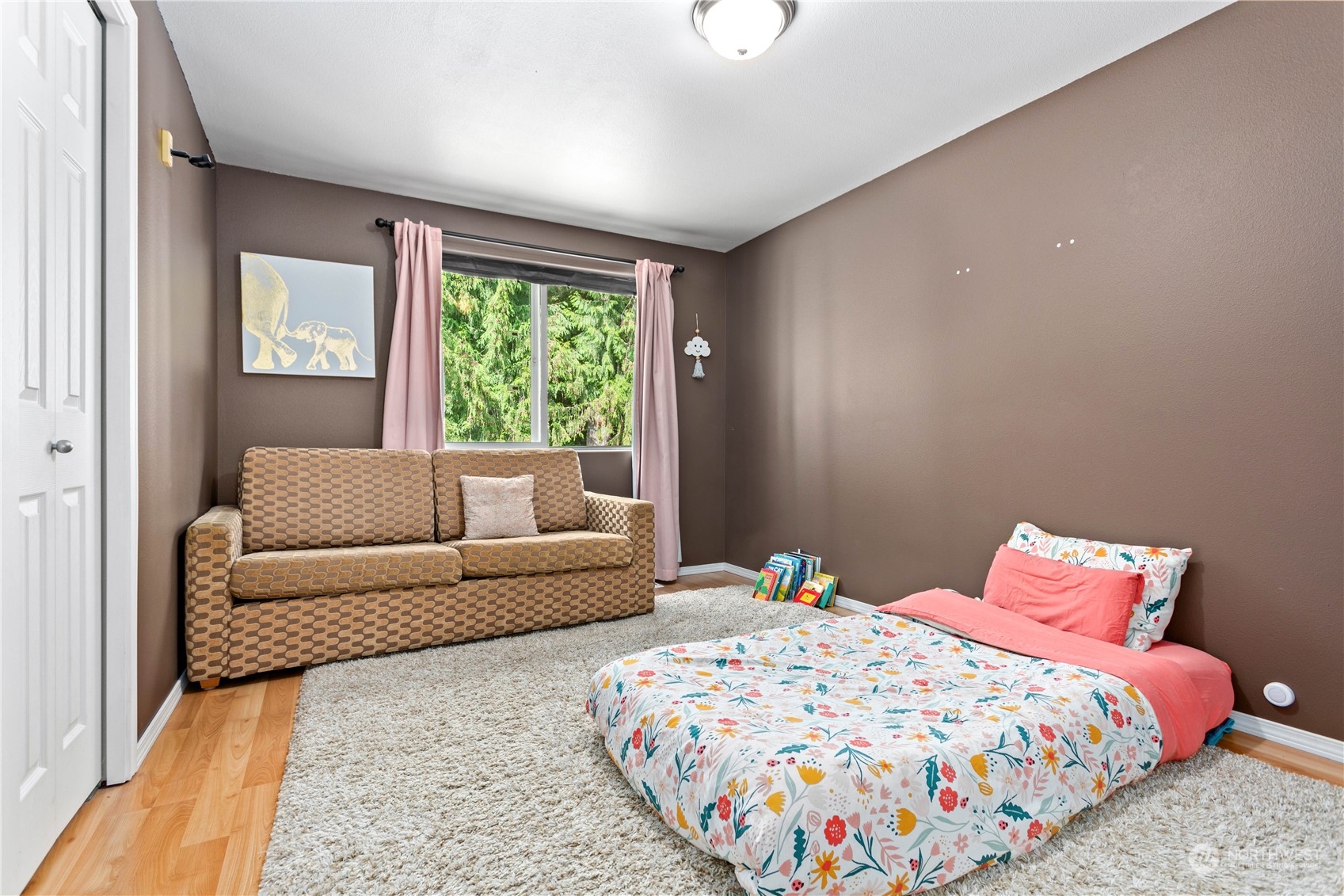3083 Ash Way Sedro-Woolley, WA 98284 - Photo 22 of 36 a bedroom with a bed and a couch