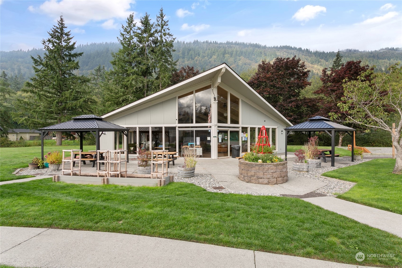 3083 Ash Way Sedro-Woolley, WA 98284 - Photo 31 of 36 a front view of a house with garden and sitting area