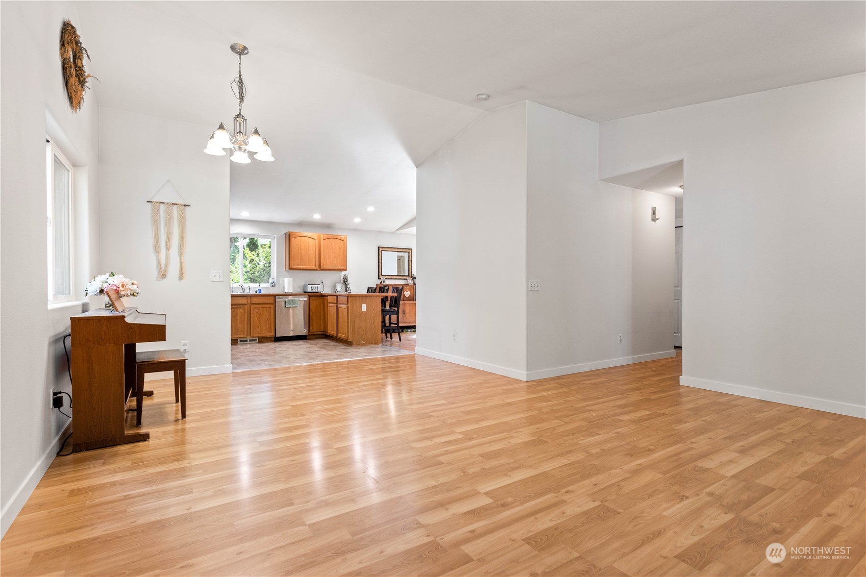 3083 Ash Way Sedro-Woolley, WA 98284 - Photo 5 of 36 a view of a livingroom with a furniture wooden floor and chandelier