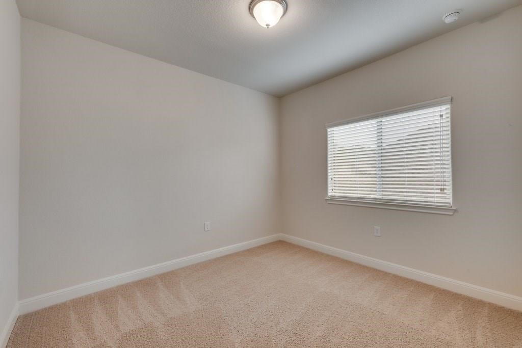 10825 Ballard Path Austin, TX 78717 - Photo 29 of 39 an empty room with a window