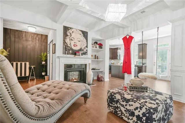 a dining room with furniture and window