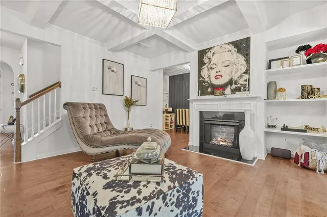 a kitchen with stainless steel appliances granite countertop a refrigerator a sink and a stove