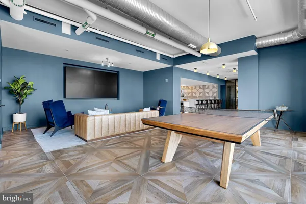 a kitchen with a table and chairs in it