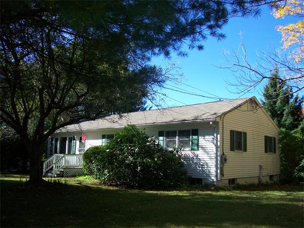 148 County Road Huntington, MA 01050 - Photo 1 of 1 a front view of house with garden