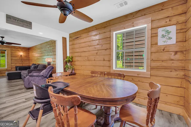 a kitchen with a sink and a refrigerator