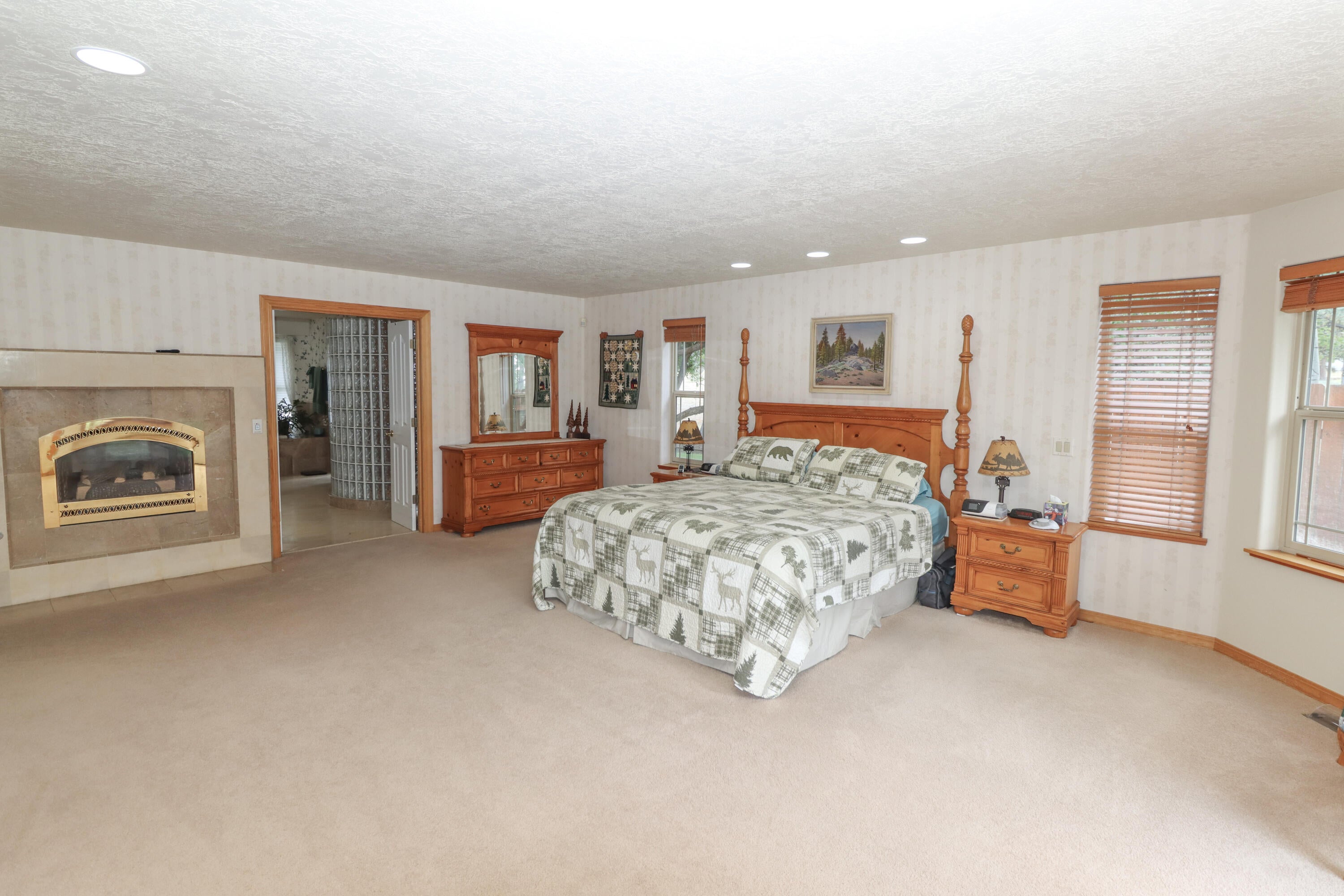 60485 Billadeau Road Bend, OR 97702 - Photo 16 of 47 Primary Bedroom Suite with Fireplace