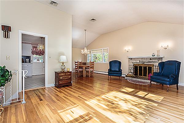 5 Trinity Road Winchester, MA 01890 - Photo 5 of 22 a living room with furniture and a fireplace