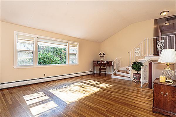 5 Trinity Road Winchester, MA 01890 - Photo 6 of 22 an empty room with piano table and windows