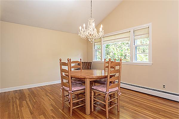 5 Trinity Road Winchester, MA 01890 - Photo 8 of 22 a view of a dining room with furniture window and outside view
