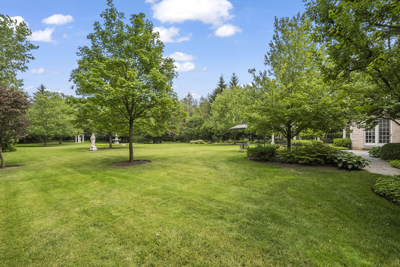 351 Wallace Road Lake Forest, IL 60045 - Photo 18 of 35 a view of a tree in a yard