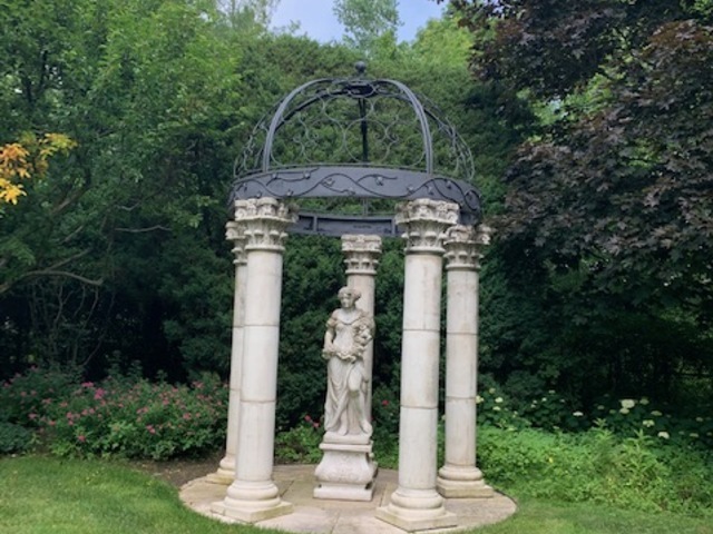 351 Wallace Road Lake Forest, IL 60045 - Photo 28 of 35 a front view of a house with a yard and fountain