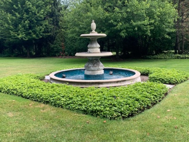 351 Wallace Road Lake Forest, IL 60045 - Photo 29 of 35 a view of a fountain in a yard with fountain