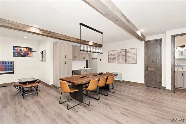 a view of a livingroom with furniture and wooden floor