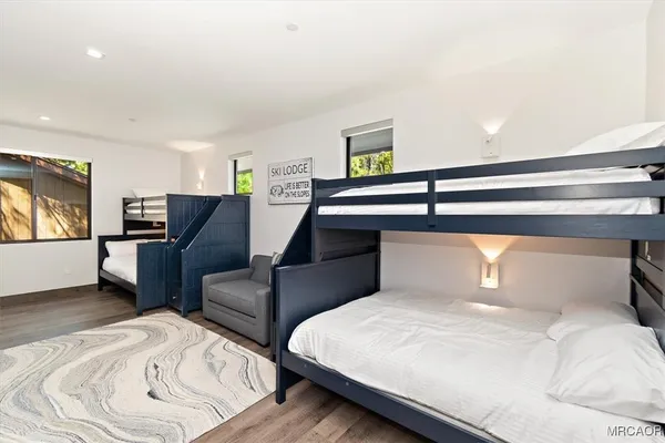 a bedroom with a bed and furniture