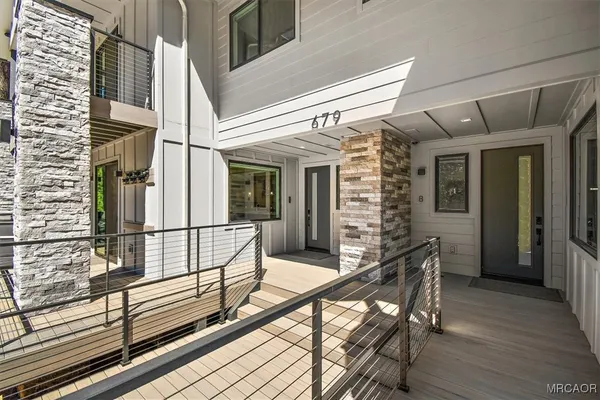 a view of balcony with furniture