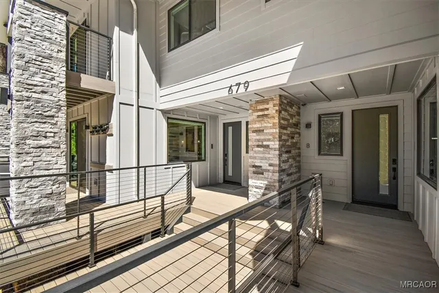 a view of balcony with furniture