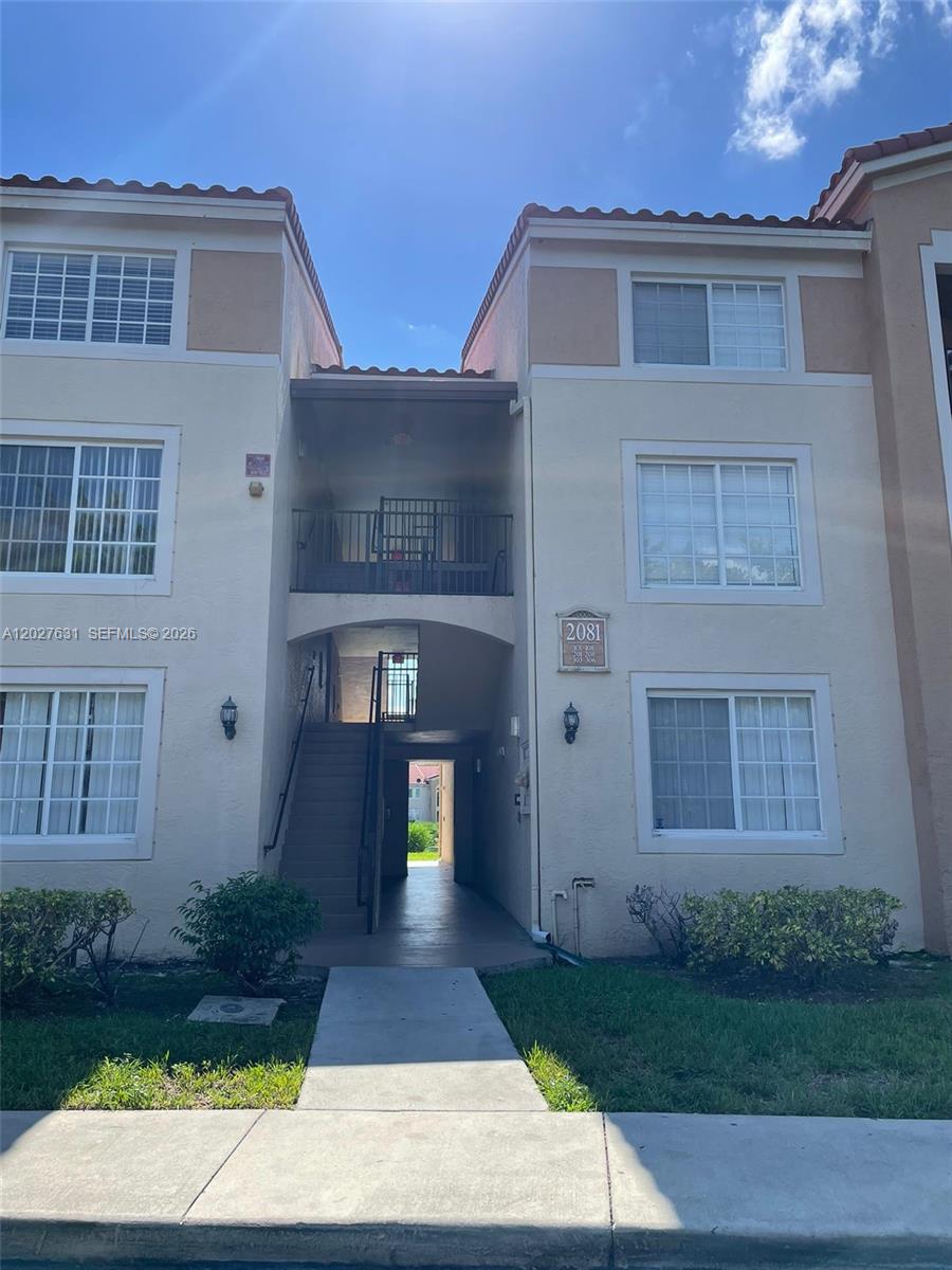 2081 Renaissance Boulevard, Unit 306 Miramar, FL 33025 - Photo 17 of 22 a front view of a house