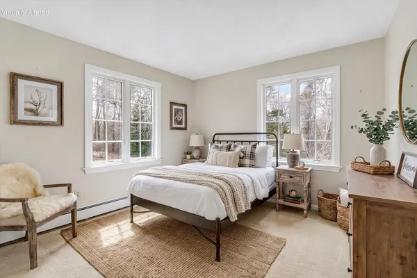 a bathroom with a sink toilet and a mirror