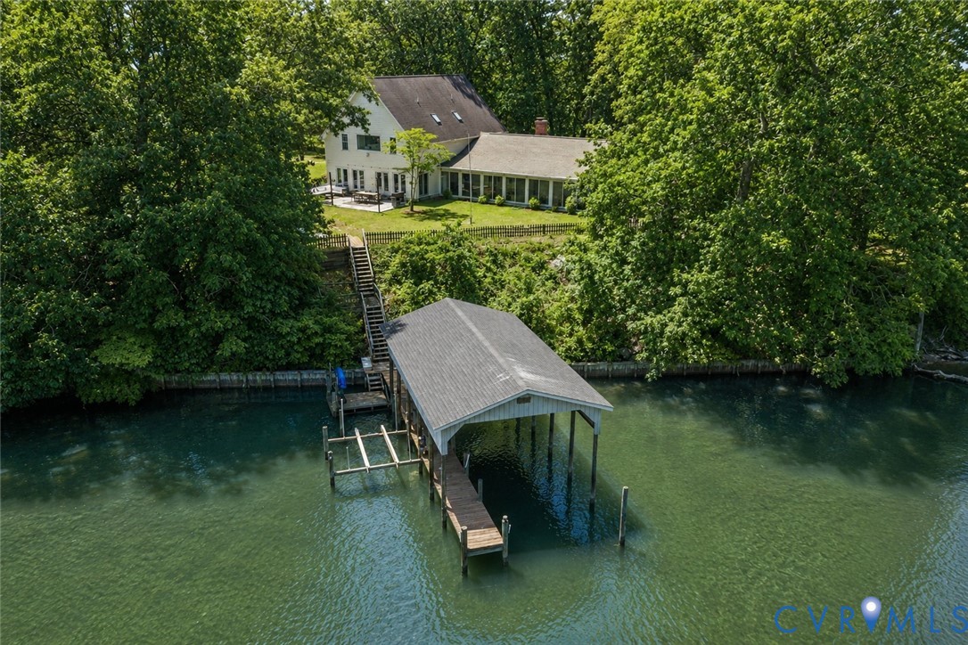437 Plainview Road Kinsale, VA 22488 - Photo 2 of 63 a view of a wooden deck with a bench