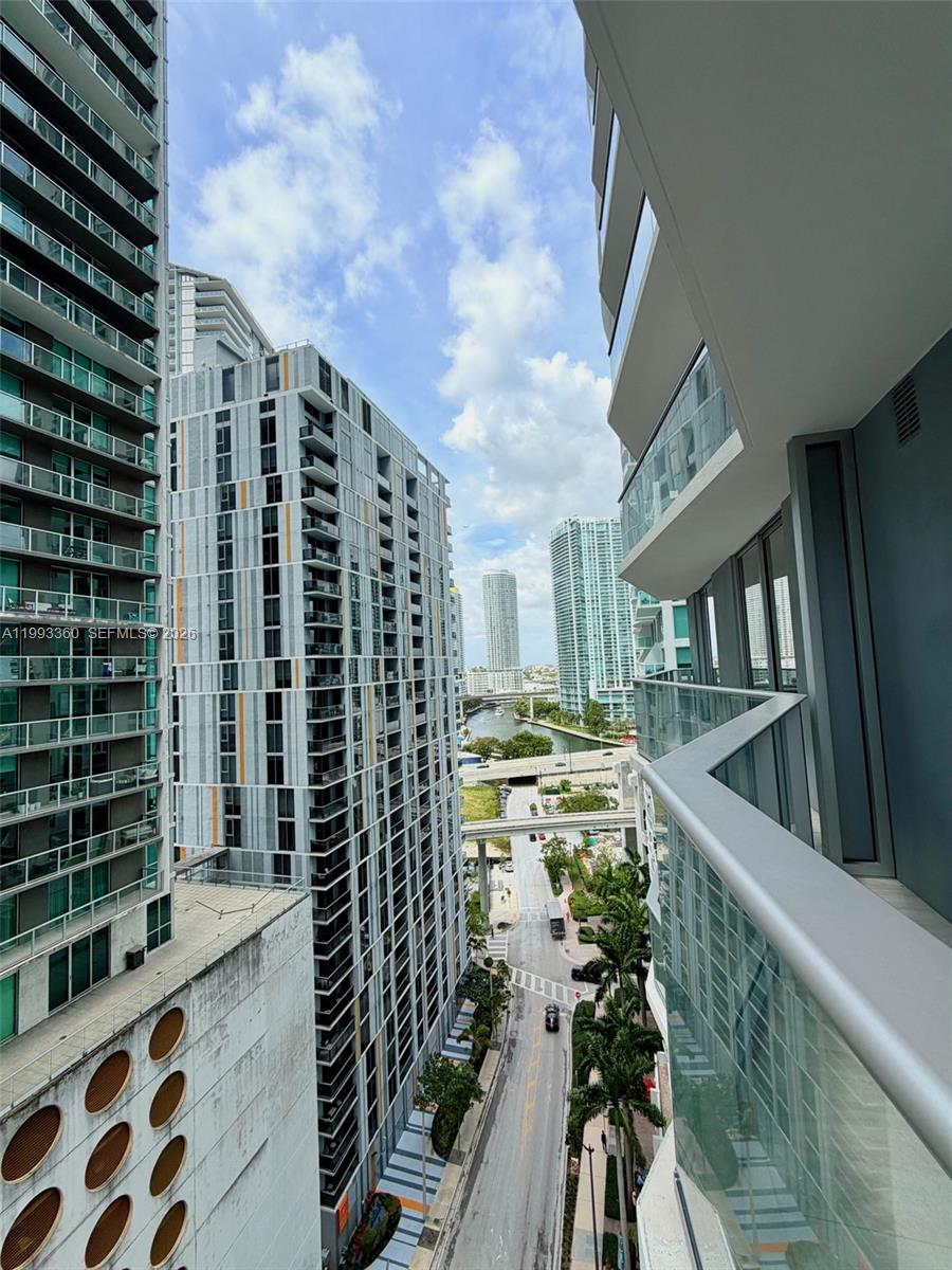 77 Southeast 5th Street, Unit 1608 Miami, FL 33131 - Photo 14 of 44 a view of balcony with a potted plant