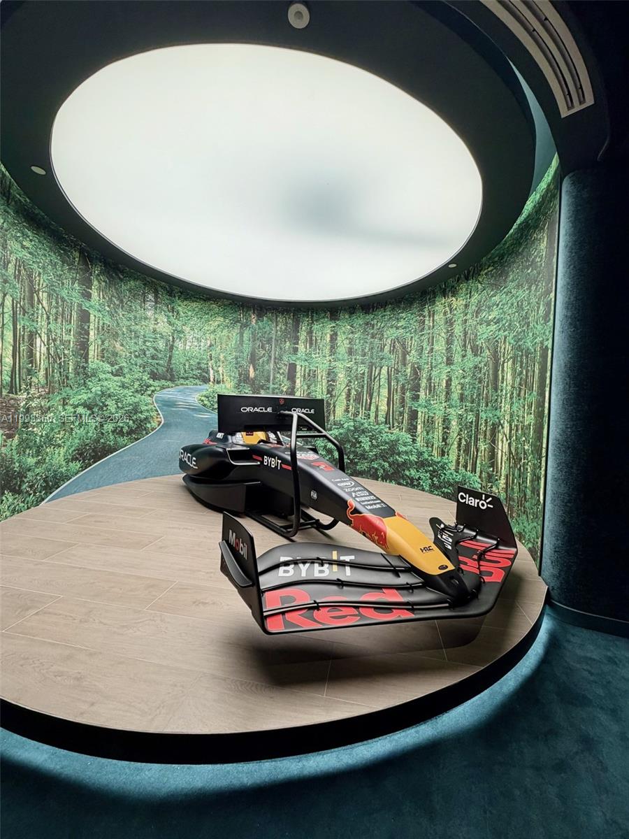 77 Southeast 5th Street, Unit 1608 Miami, FL 33131 - Photo 21 of 44 a view of a swimming pool with a yard from a balcony