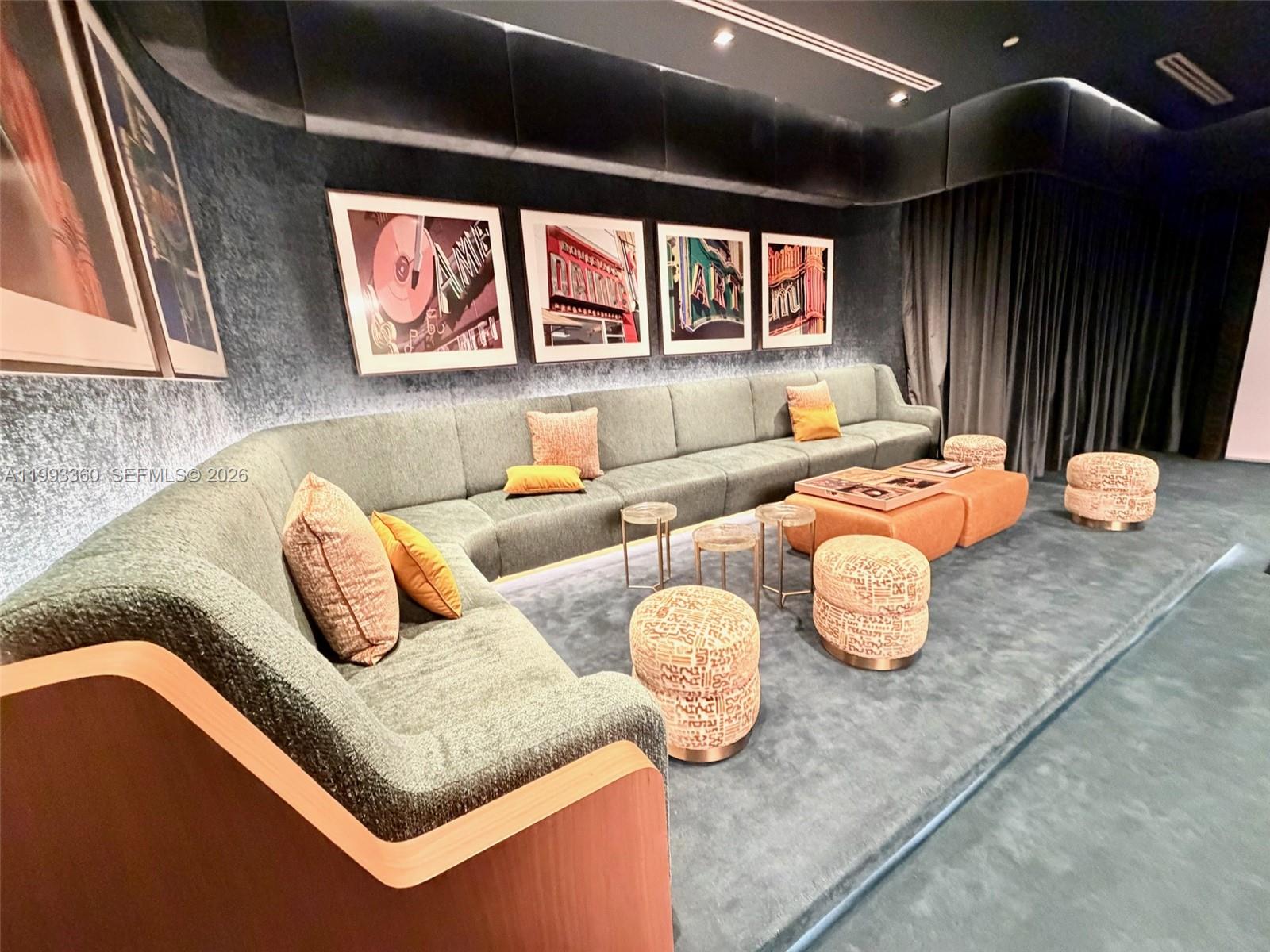 77 Southeast 5th Street, Unit 1608 Miami, FL 33131 - Photo 22 of 44 a outdoor living room with furniture and a large window