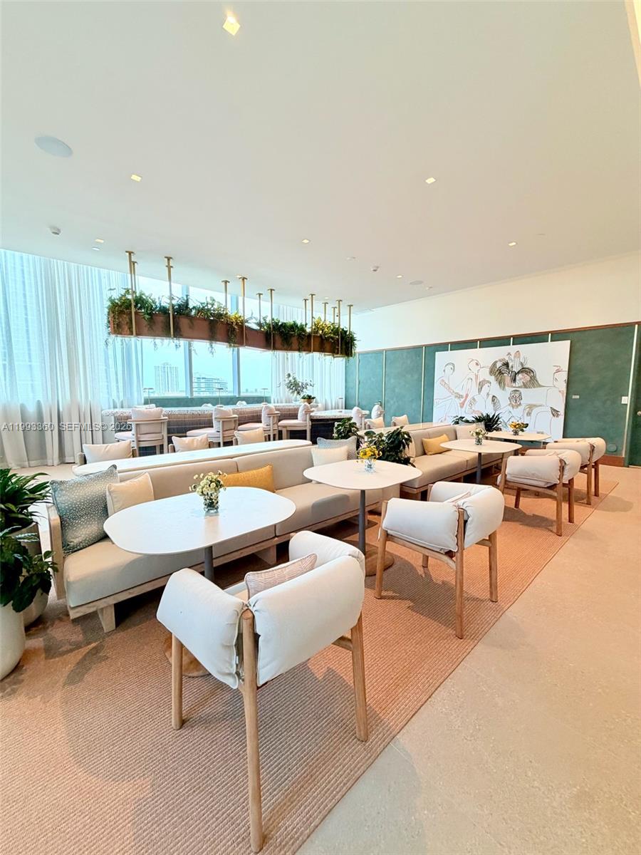 77 Southeast 5th Street, Unit 1608 Miami, FL 33131 - Photo 40 of 44 a living room with furniture