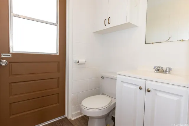 a bathroom with a toilet and a sink