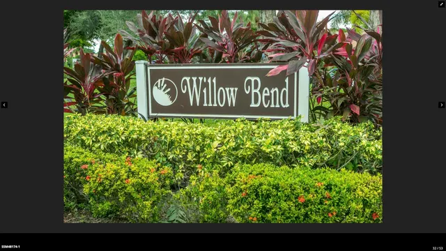 a view of swimming pool with a yard