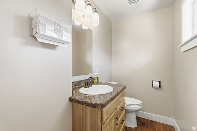 2420 West Old Hwy Road Morgan, UT 84050 - Photo 18 of 54 Bathroom featuring vanity and dark wood-style floors