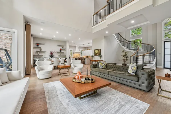 a living room with furniture and white walls